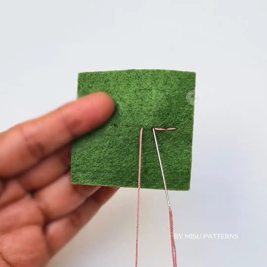 returning into the previous stitch.