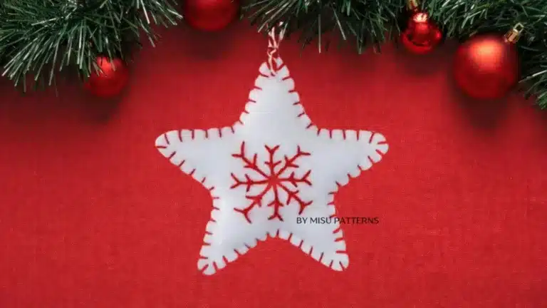 Handmade Christmas star ornament made of felt with embroidered details