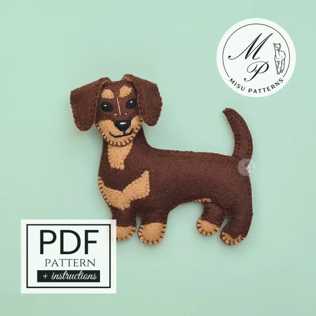 Front view of handmade Dachshund – Sausage Dog felt ornament in light brown and brown
