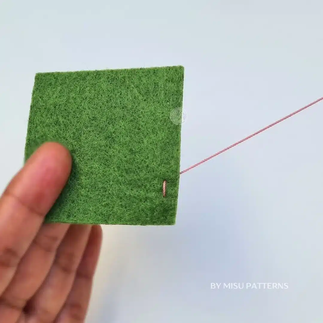 Pull the thread through